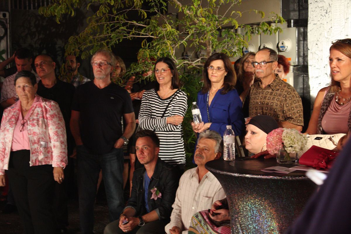 Guests listening to speakers at helium creative